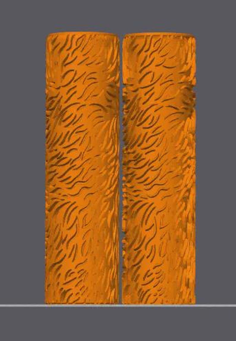 May include: Two cylindrical orange rollers featuring a repeating, carved, fur-like texture across their entire surface. The rollers are positioned vertically side-by-side, displaying a consistent pattern of short, curved, and irregular indentations.
