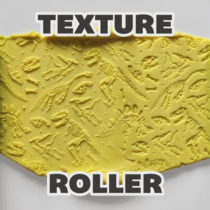 May include: A light blue cylindrical texture roller featuring an embossed pattern of dinosaur skeletons. The roller is shown pressing into a flat, yellow, pliable material, leaving a detailed impression of various prehistoric fossils across the surface.