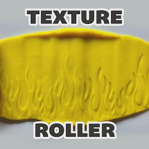 May include: Two orange cylindrical texture rollers with a flame pattern, positioned on either side of a flattened piece of yellow clay. The clay displays a raised flame design imprinted by the rollers. The text TEXTURE ROLLER is visible.