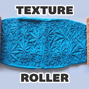 May include: A blue clay sheet with a cannabis leaf pattern is shown between two orange texture rollers. The word "TEXTURE" is above the clay and the word "ROLLER" is below it.