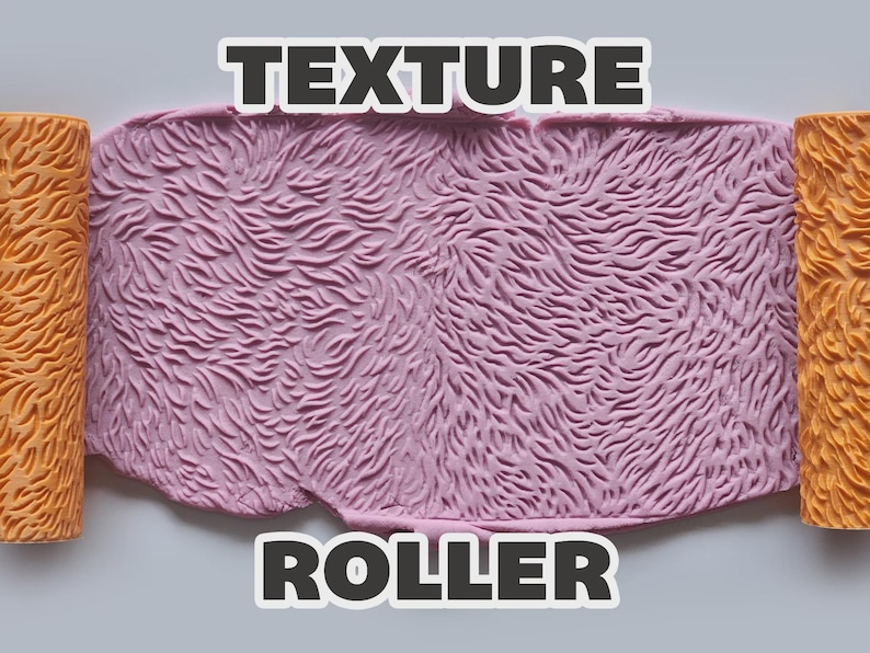May include: An orange cylindrical texture roller with a raised fur-like pattern positioned on both sides of a light purple slab of material that has been imprinted with the same fur-like texture. The text "TEXTURE ROLLER" is visible.