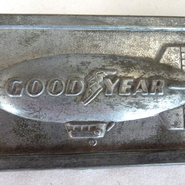 Vintage Goodyear blimp advertising belt buckle pewter tire rubber