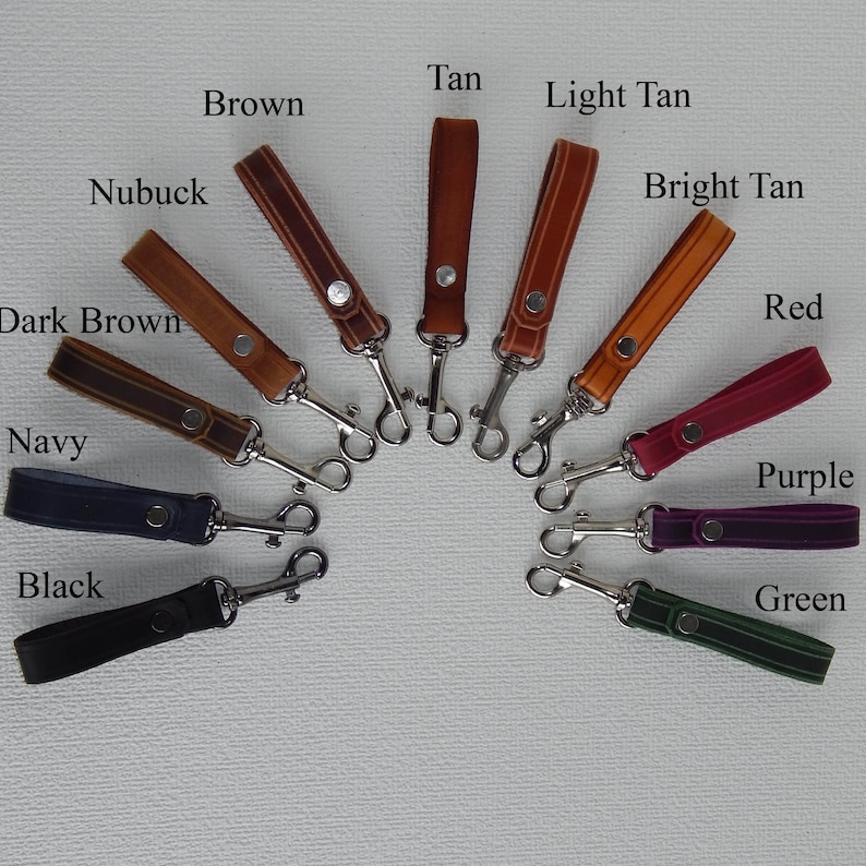 Simple, strong and useful leather loops with a metal spring clip firmly attached.   Current selection shown - Black, Navy, Dark Brown, Tan, Nubuck, Brown, Tan, Light Tan, Bright Tan, Rea, Purple and Green.
