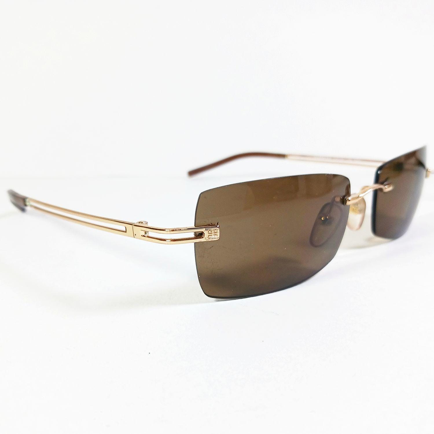 Givenchy SGV 004 Col 300X Gold/brown Vintage Slim Rimless 