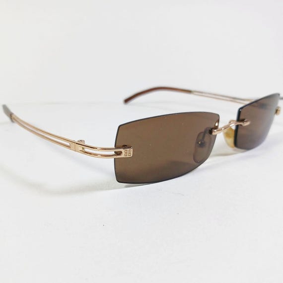 Givenchy SGV 002 Col 300X Gold/brown Vintage Slim Rimless  display picture 3