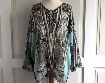 Roberto Cavalli turquoiseblauwe/zwarte/witte zijden blouse met vetersluiting