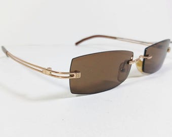 Givenchy SGV 002 Col 300X Gold/brown Vintage Slim Rimless  display picture 1