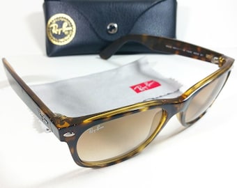Gafas de sol Ray Ban RB 2132 710/51 New Wayfarer con lentes degradadas color marrón carey y estuche.