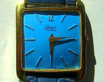 Swiss made Renis Mid Century 17 Rubis, 17 Jewel, Wristwatch, very thin with Stainless Steel back, not currently working.