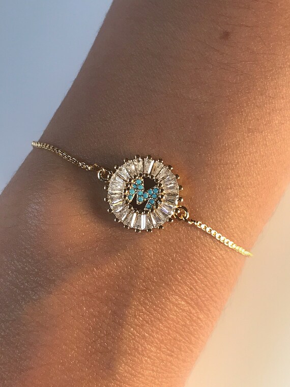 Pulsera Ajustable Bañada En Oro Con La Letra Inicial En Color Turquesa Y Rodeada De Circones Blancos Regalo Perfecto Y Delicado Joyeria