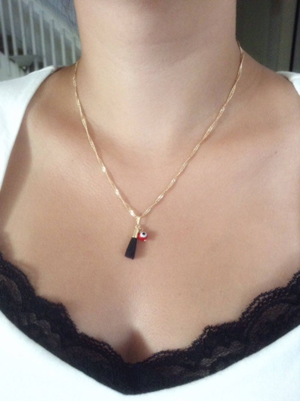 Mano azabache necklace discount