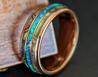Anillo de bodas de tungsteno con ópalo en oro rosa de 18 quilates y 8 mm de grosor. Anillo de bodas tropical para hombre con ópalo azul y incrustaciones de abulón.
