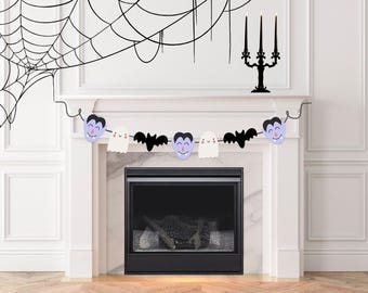 May include: A Halloween-themed mantelpiece decoration featuring a garland with vampire faces, ghosts, and bats. A black spiderweb and a candelabra with three candles are also visible. The fireplace has a black frame and a white mantel.