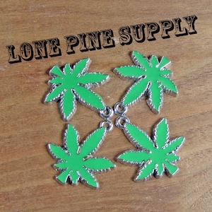 Set of 4 Charms, 23mm x 28mm (1 x 1 1/8 in)  Maple Tree Leaf Charm. Marijuana Leaf Charm. Green Pot Leaf Charm. Pot Leaf.