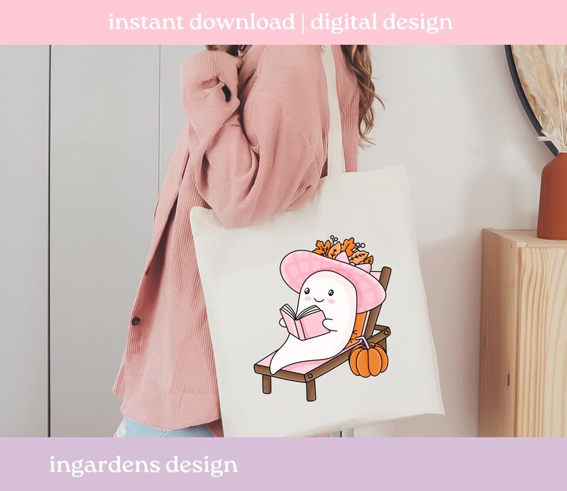 May include: A white tote bag featuring a cartoon ghost wearing a pink hat and reading a book while relaxing on a beach chair. A small orange pumpkin and fall leaves are also depicted. Text at the top reads "instant download | digital design".