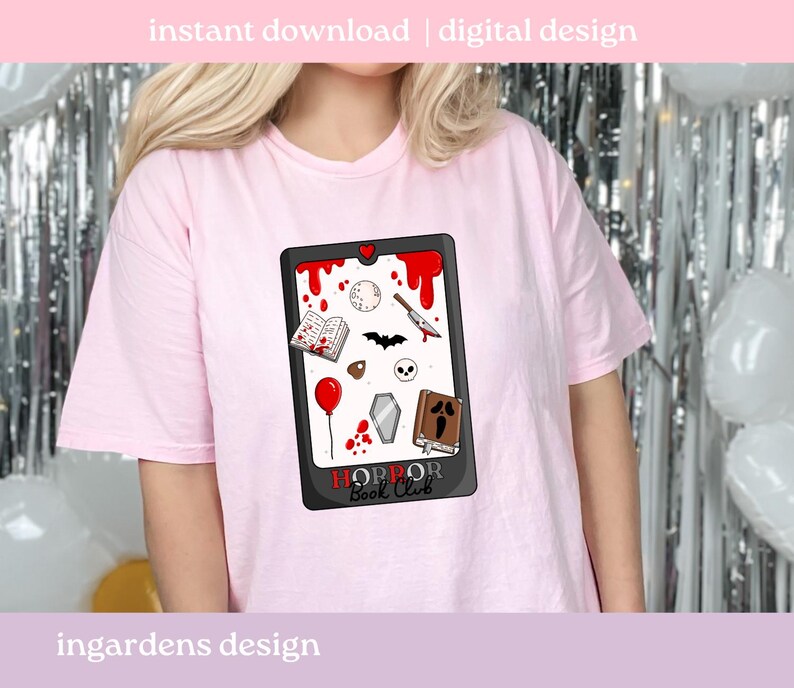 May include: A pale pink t-shirt with a graphic design featuring a black frame and red blood splatter. The design includes a book, knife, bat, skull, coffin, and the text "HORROR Book Club". The words "instant download | digital design" are at the top.