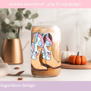 May include: A clear glass with a coffee drink and a cartoon design of cowboy boots decorated with seashells. The glass has the text "instant download | png & svg design" and "ingardens design".