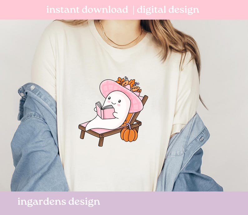 May include: White t-shirt featuring a cartoon ghost wearing a pink sun hat and reading a book while relaxing on a wooden beach chair. An orange pumpkin sits nearby. Text at the top reads "instant download | digital design" and at the bottom "ingardens design".