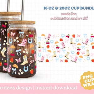 May include: Two glass cups with wooden lids, decorated with a repeating pattern of cowboy boots, butterflies, cherries, and horseshoes. The cups are filled with a dark liquid and have metal straws. The text "16 OZ & 20OZ CUP BUNDLE" is at the top.