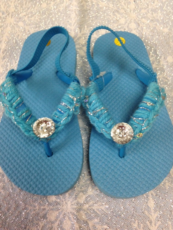 girls blue flip flops