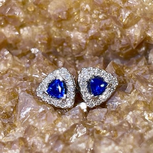 Trillion Cut Natural Blue Sapphire Triangle studs with Diamonds in 925 Sterling Silver with Rhodium.