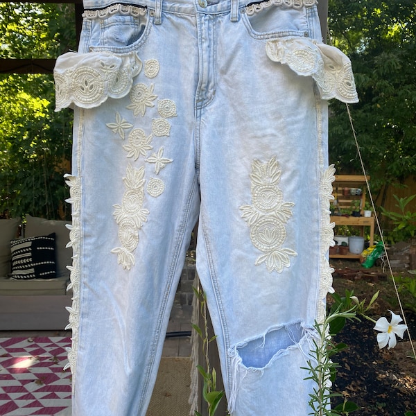 THE LACE JEANS vintage reworked jeans light blue distressed ripped denim jeans hand sewn linen lace embroidery ripped upcycled patches boho