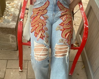 Reworked jeans red gold embroidery dressy boho hippie statement one of a kind custom handmade light wash distressed Indian saree denim pants