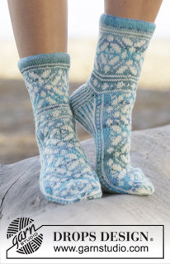 Hand knit socks. Wool socks. Bed socks. House socks. Girl and woman.
