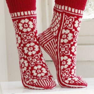 Beautifully knitted socks with a nice pattern. House socks.