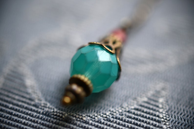 Orisha Blue and red glass and brass ear pendants