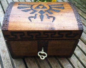 Legend of zelda chest, ring box, small gift.