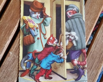 Vintage Alfred Mainzer Cat Postcard of revolving door, with kittens and poodle chaotic fun. Number 4949. Postmarked 1967.