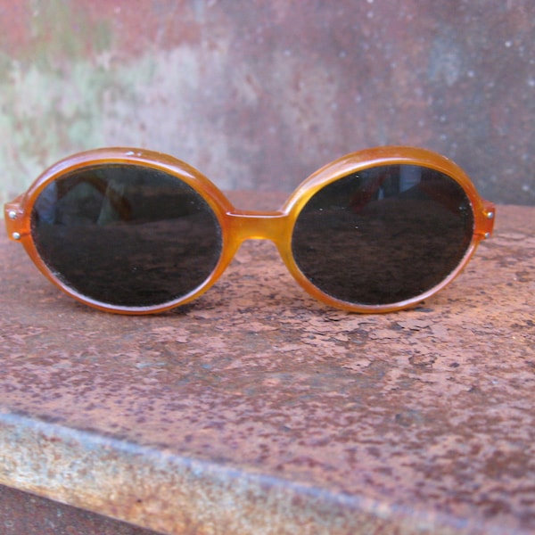 1960s RETRO MOD SUNGLASSES with round plastic frames and grey tinted lenses. True vintage style fashion statement..