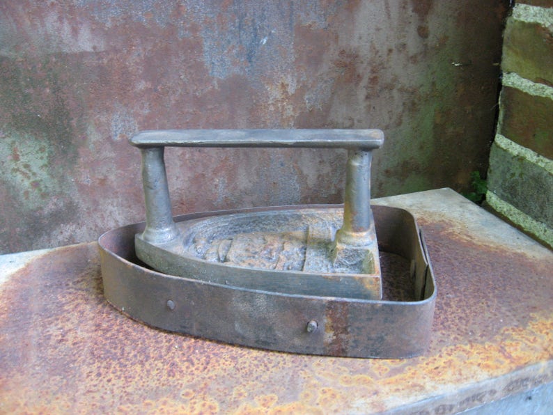 Antique VICTORIAN FLAT IRON 'Le Parisien' and base. Rare French sad hand iron and blacksmith made rustic trivet. image 1