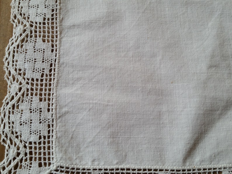 Edwardian linen and lace handkerchief. Fine white linen with hand made cotton lace trim around the edges. Quality antique from France.