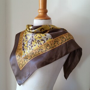 Vintage FRENCH LEOPARDS SCARF in rich gold and bronze earth tones. Wild cat faces and spotted pattern with baroque border.