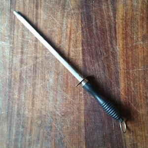 Vintage FRENCH KNIFE SHARPENER with rubber handle and ring for hanging.  Classic butchers blade sharpening tool.