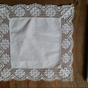 Edwardian linen and lace handkerchief. Fine white linen with hand made cotton lace trim around the edges. Quality antique from France.