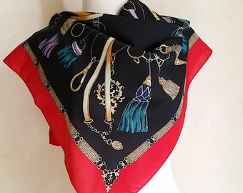 Vintage ART NOUVEAU DESIGN French Scarf of tassels, heraldry and ribbons in red, blue, gold colors on black background.
