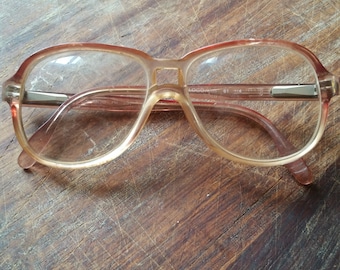 1970s LOGO PARIS EYEGLASSES, French vintage boho frames in tinted red to clear plastic.