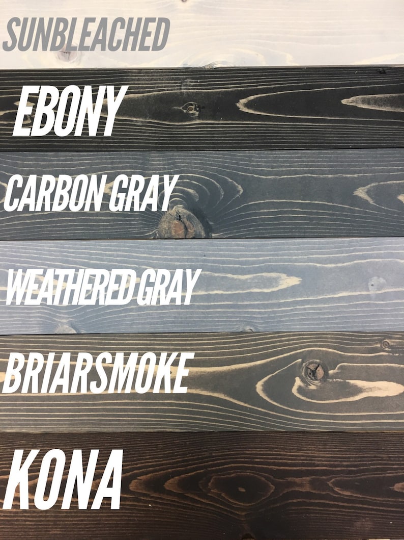 May include: Six wood samples stained in different colors: Sunbleached, Ebony, Carbon Gray, Weathered Gray, Briarsmoke, and Kona.