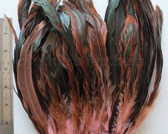 16g (0.6ozs) 8-10" half bronze baby pink schlappen coque rooster tail feathers, ~80pc. SKU: 7F31