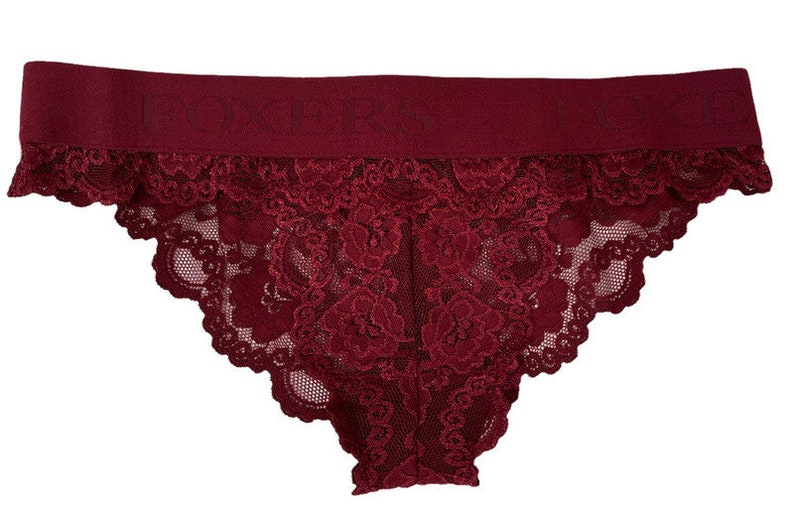 May include: Burgundy lace underwear with a wide elastic waistband.
