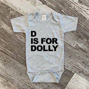 D is for Dolly | Dolly Parton Baby Bodysuit | Alphabet Baby Gear