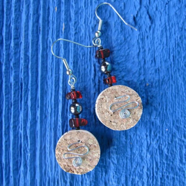 Earrings made with slices of cork red glass beads (recycled) and magnetite recycled beads