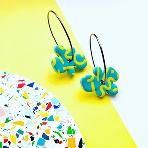 Statement bold blue & green earrings with squiggle pattern 5.