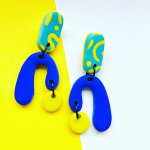 Statement bold blue & green earrings with squiggle pattern 1.