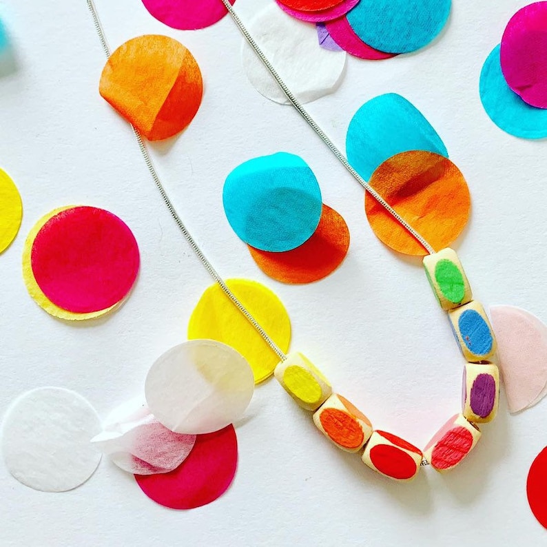 minimal style wooden statement necklace in rainbow colours. Geometric bead