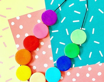 Geometric flat circle bead, minimal style wooden statement necklace in rainbow colours.