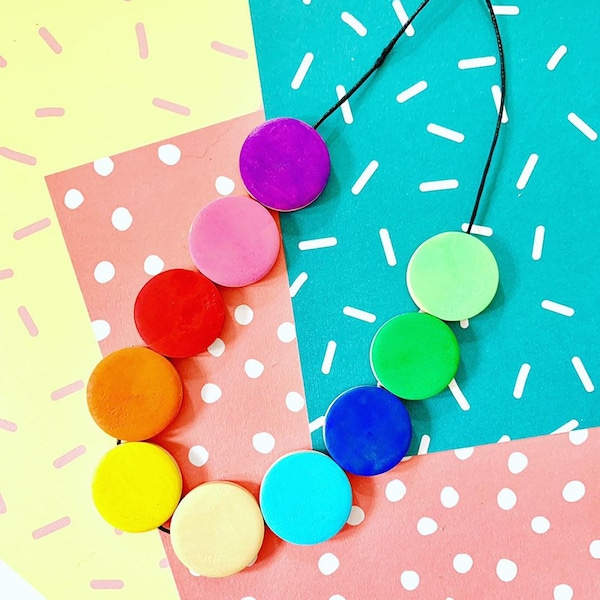 Geometric flat circle bead, minimal style wooden statement necklace in rainbow colours.